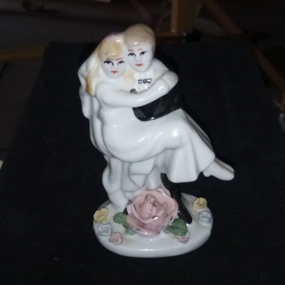 Porcelain Figurine with Floral Base
